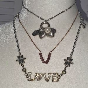 Lot of 3 fashion necklaces with charms